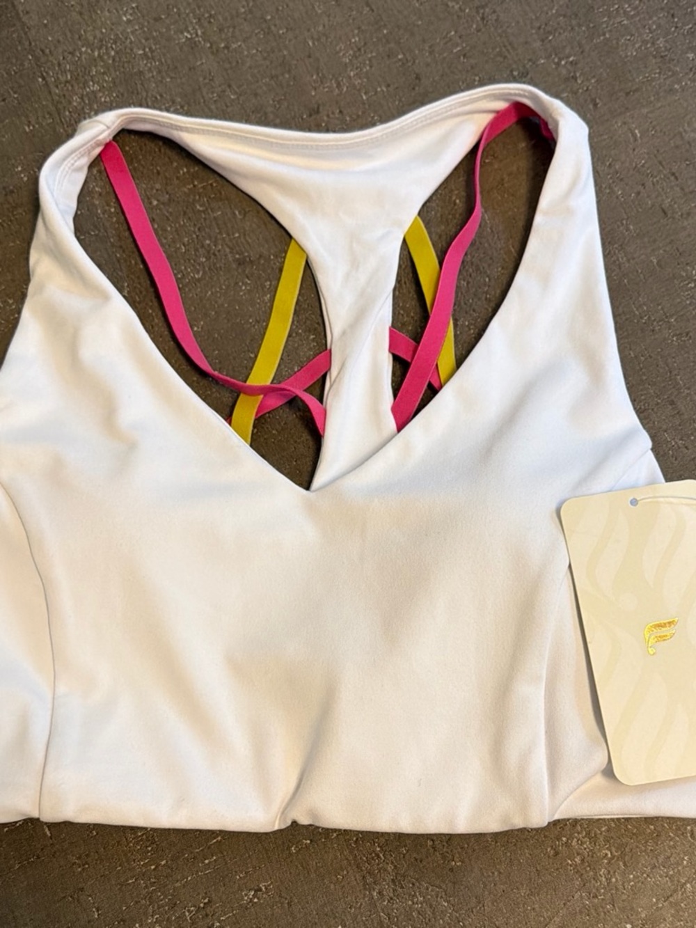 Fabletics White Sports Bra with Pink and Yellow Strappy Back Detail